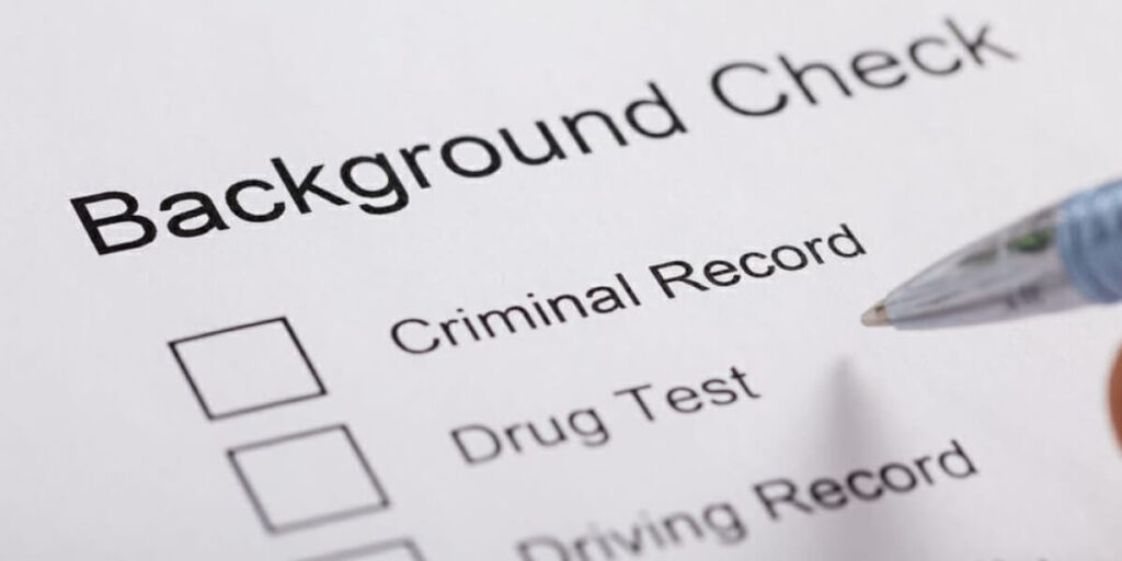 A background check form listing criminal record, drug test, and driving record options.