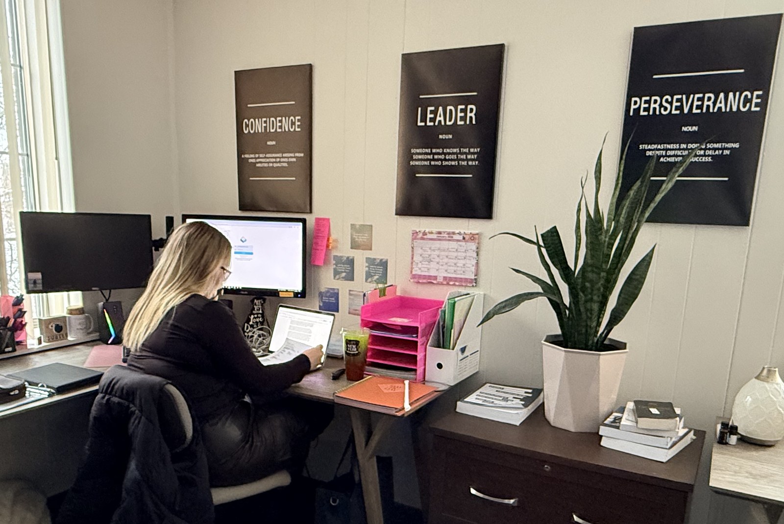 A PPIC team member working at her desk